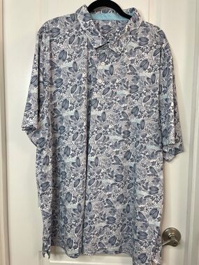 Puma Men's White Polo with Navy Blue Leaf Print